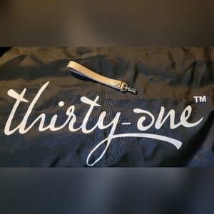 NWOT 31 wristlet strap bronzey color